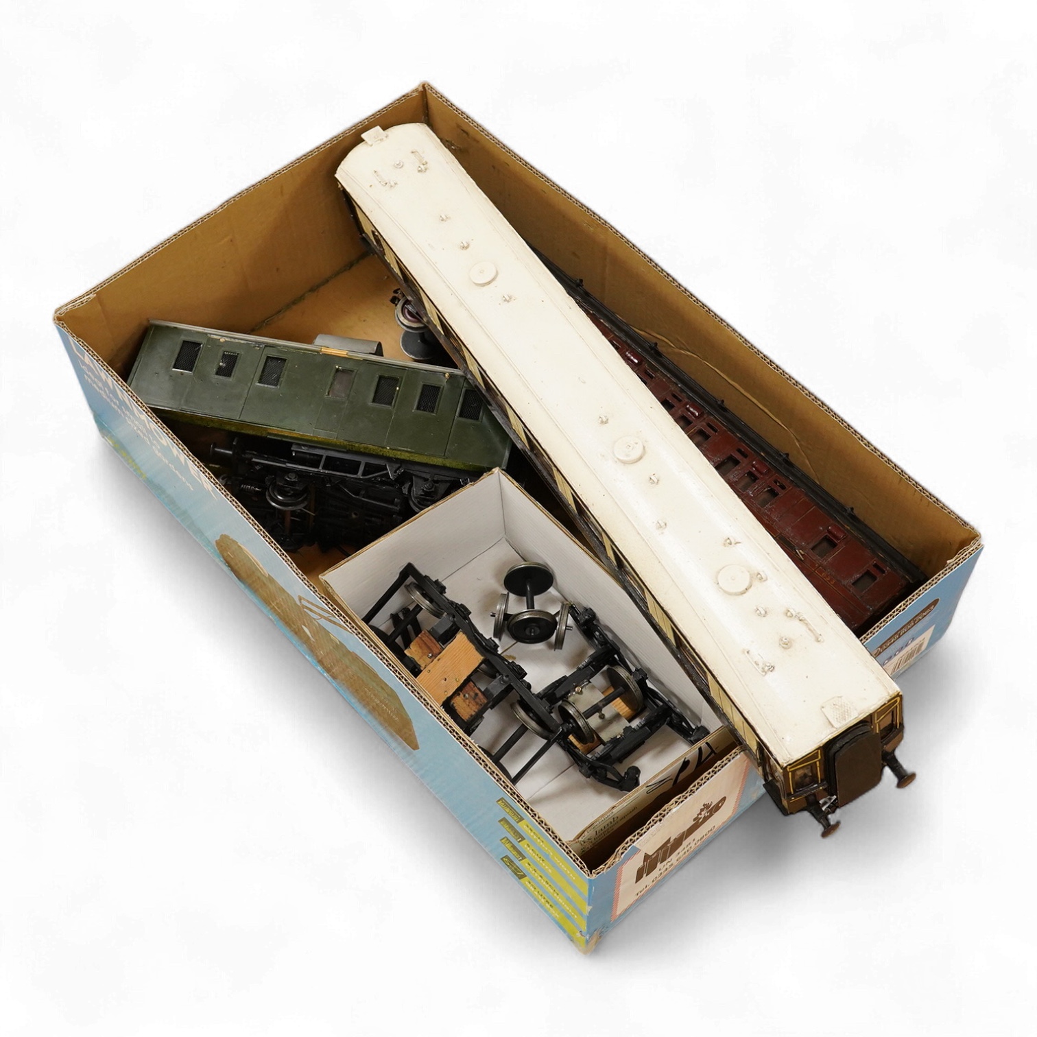 Two Gauge One bogie coaches; a Midland Railway clerestory coach, together with a 12-wheel Pullman car (bogies af), plus an American outline caboose, some scratch building and adaptation from kits, etc.